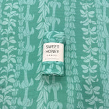 Teal Lei Swaddle Blanket